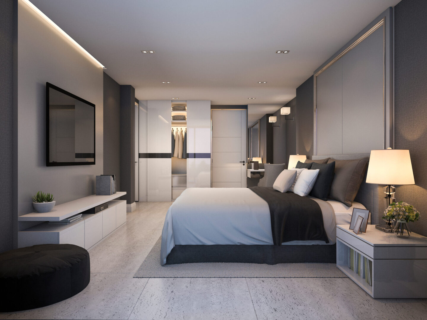 A bedroom with a bed, dresser and tv.